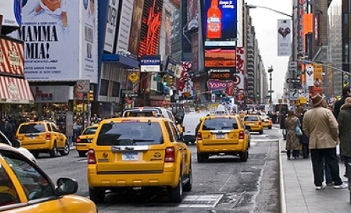 man and woman on a motorcycle